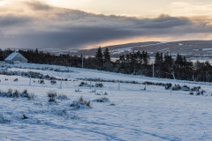 Snowy sky over Loch Shin