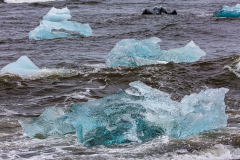 Icebergs floating in the sea of Diamond Beach, Jökulsárlón