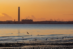 Sunset behind the Fawley Power Station