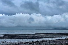 Stormy clouds across Keyhaven Marshes
