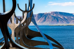 The Sun Voyager - with a mountain backdrop, Reykjavik
