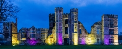 The floodlit ruins of Cowdray Castle
